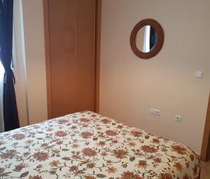 Łóżko lub łóżka w pokoju w obiekcie APARTAMENTO EN PUNTA UMBRÍA