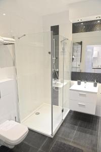 Kúpeľňa v ubytovaní Apartamenty Zamkowa