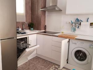 A kitchen or kitchenette at Residencial Colibrí