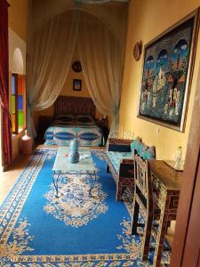 Postel nebo postele na pokoji v ubytování Riad Marlinea