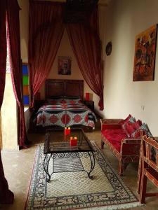 Postel nebo postele na pokoji v ubytování Riad Marlinea