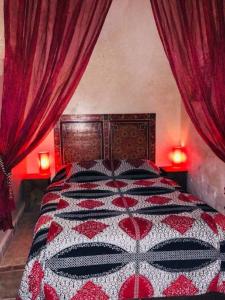 Postel nebo postele na pokoji v ubytování Riad Marlinea