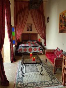 Postel nebo postele na pokoji v ubytování Riad Marlinea