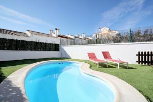 Bazén v ubytování Magnífica casa con piscina privada nebo v jeho okolí