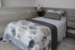 Postel nebo postele na pokoji v ubytování ARI Hotel