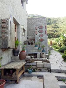 Zahrada ubytování 芹壁梅好石屋 Mayhao Stone House