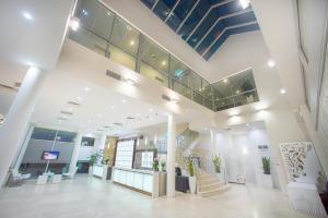 an office lobby with a staircase and a stair case at The Tea Tree in Modbury