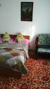 En eller flere senge i et værelse på Resort 10