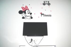 A television and/or entertainment centre at Qstay Sitiawan Townhouse (Minnie Dreams) - 米妮梦