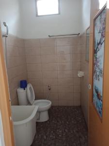 Koupelna v ubytování Noah Hotel Silangit