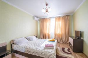 
Кровать или кровати в номере Apartments in Moscow Krilatsky
