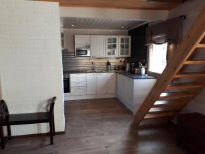 A kitchen or kitchenette at Ivalo Lake Cottage