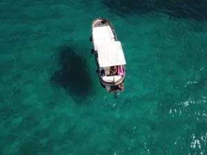 an overhead view of a boat in the water at Le Terrazze in Otranto