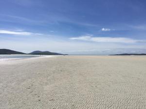 a sandy beach with footprints in the sand at George's House - 1 Leacklee in Manish