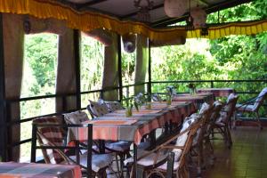 Un restaurante u otro lugar para comer en Siddhartha Garden Ayurveda