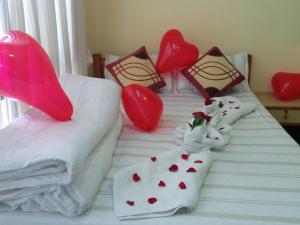 Postel nebo postele na pokoji v ubytování Looniva Guest House