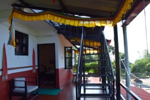 Un balcón o terraza en Siddhartha Garden Ayurveda