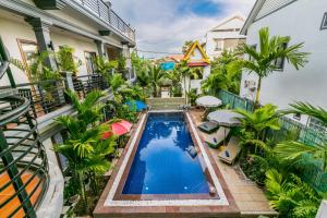 an overhead view of a swimming pool in a house at Asanak D'Angkor Boutique Hotel in Siem Reap