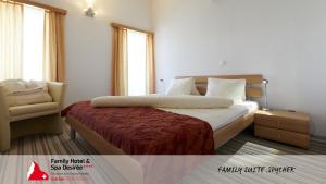 Ένα ή περισσότερα κρεβάτια σε δωμάτιο στο Family Hotel Desirée