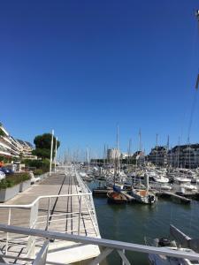 a marina filled with lots of boats on the water at Ar Kevel in La Baule +12 photos