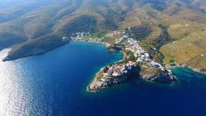 an aerial view of a small island in the water at kamares kythnos in Kanala