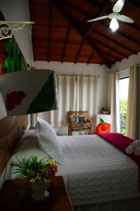 מיטה או מיטות בחדר ב-Star Búzios Pousada