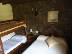 A bed or beds in a room at Casa Rural Los Cascajales Még 34 kép