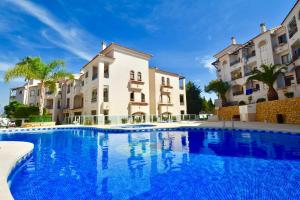 Bazén v ubytování Renteando Albir Apartments nebo v jeho okolí