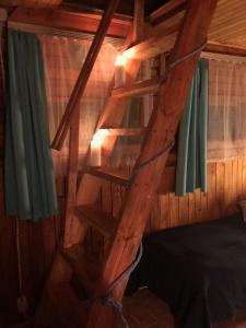 
Łóżko lub łóżka piętrowe w pokoju w obiekcie Tleniowo
