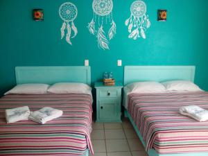 Katil atau katil-katil dalam bilik di Hotel Quinta Mar y Selva