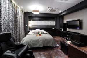 TV o dispositivi per l'intrattenimento presso HOTEL MYTH-Resort -ホテル マイス リゾート- adult only