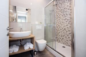 Kúpeľňa v ubytovaní Lugo Apartments + 37 fotografií