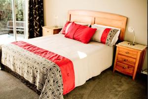 En eller flere senge i et værelse på Apartment on Stansell