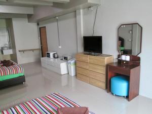 TV a/nebo společenská místnost v ubytování Pineapple Guesthouse