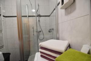 Koupelna v ubytování Apartments Hemer + 27 fotografií