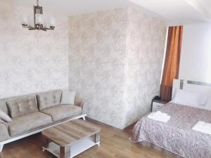 Postel nebo postele na pokoji v ubytování Dream Tower