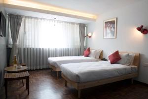 Letto o letti in una camera di Potala Guest House