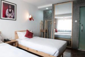 Letto o letti in una camera di Potala Guest House