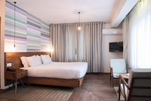 Letto o letti in una camera di Potala Guest House