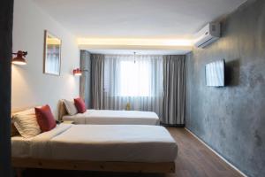 Letto o letti in una camera di Potala Guest House