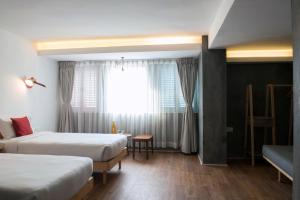 Letto o letti in una camera di Potala Guest House