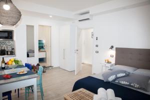Posteľ alebo postele v izbe v ubytovaní Sorrento Time Guest House