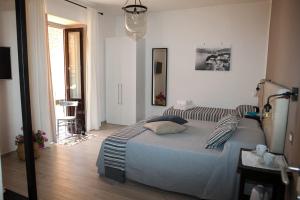 Posteľ alebo postele v izbe v ubytovaní Sorrento Time Guest House