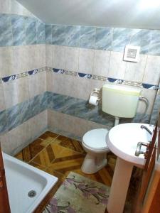 Koupelna v ubytování Perla Neagră Lotus Spa + 36 fotografií
