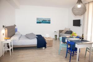 Posteľ alebo postele v izbe v ubytovaní Sorrento Time Guest House