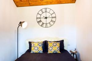 Posteľ alebo postele v izbe v ubytovaní Domus Porto Di Traiano Resort