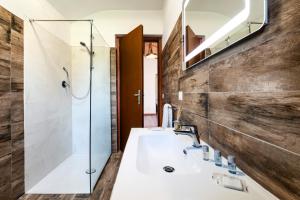 Kúpeľňa v ubytovaní Domus Porto Di Traiano Resort
