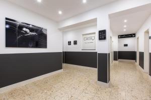 a room with black and white paintings on the walls at SMARTY Leichlingen-Cologne - KONTAKTLOSER SELF CHECK-IN in Leichlingen