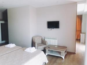Postel nebo postele na pokoji v ubytování Dream Tower