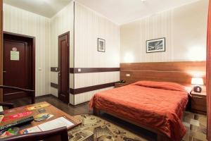 Postel nebo postele na pokoji v ubytování Viva Hotel